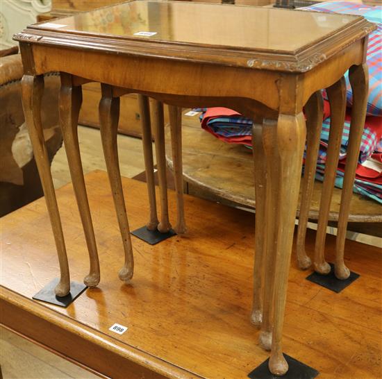 A nest of walnut tables W.55cm